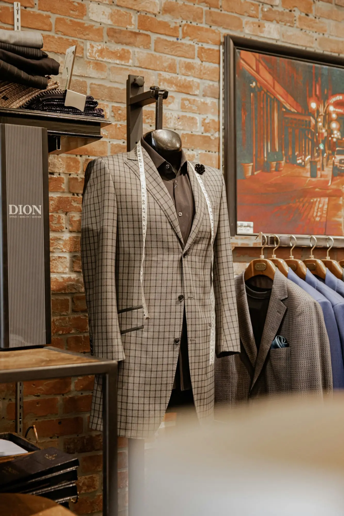 Recutting and tapering clothes for a modern fit at Enoch Tailor Shop